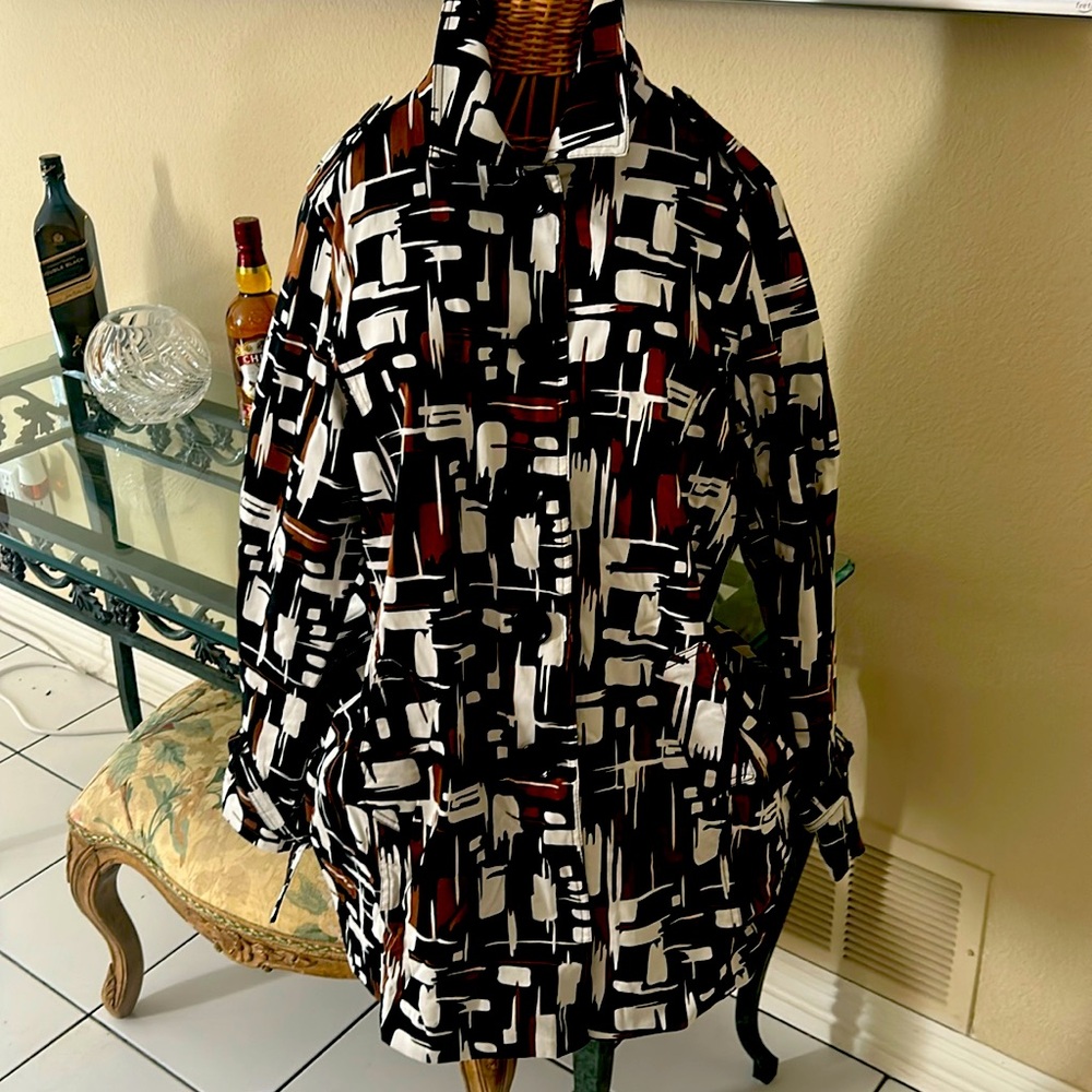 rain/car coat by appraisal front slit pockets, center back seam in print